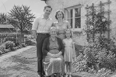Simulated damaged version of A family portrait in the garden