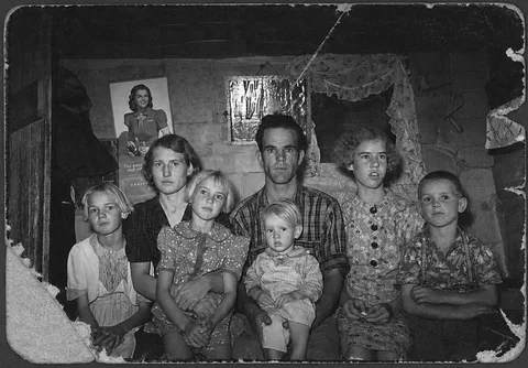 Before restoration: A damaged family photograph