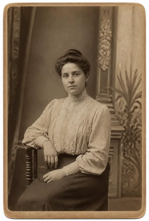 After restoration: An early-1900s portrait with its corner rebuilt