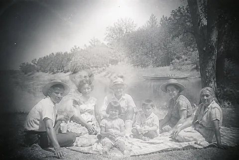 Before restoration: A lakeside picnic with detail restored