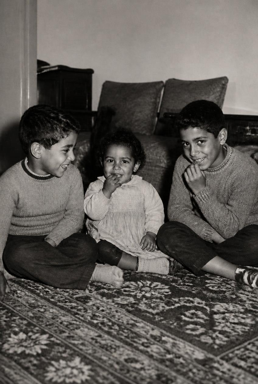 After restoration: Three children behind a repaired fold
