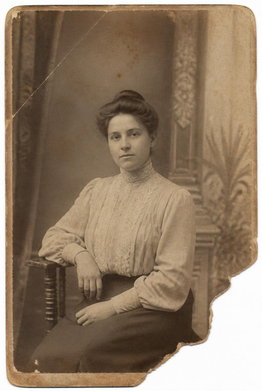 Before restoration: An early-1900s portrait with its corner rebuilt